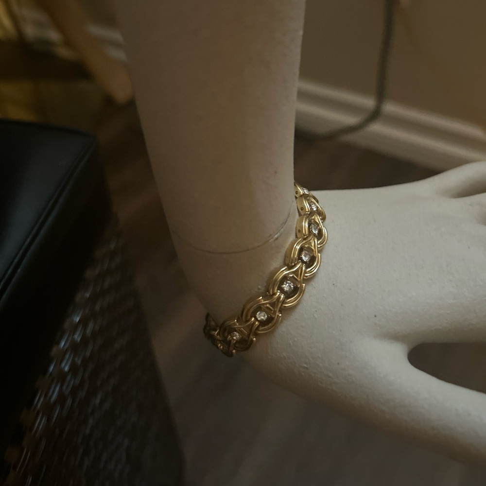 Statement piece: 7 1/2” white stone bracelet set in yellow gold stamped China